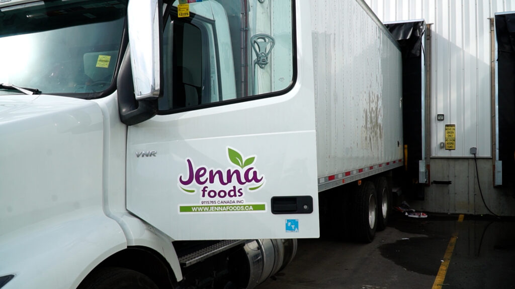 Jenna Foods delivery truck transporting premium food and beverage products to retailers across Canada.